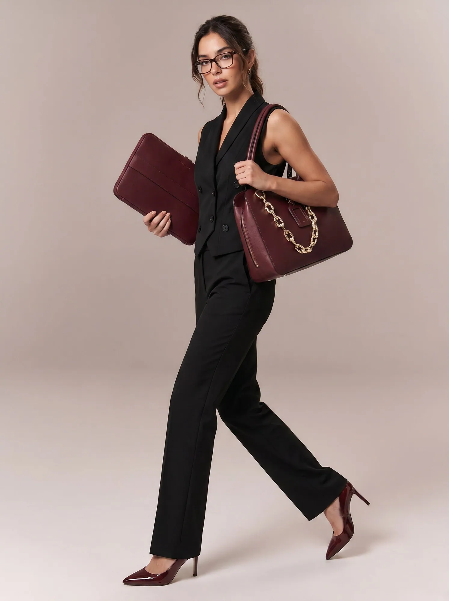 Bossbella workwear on a walking model, made by Helium