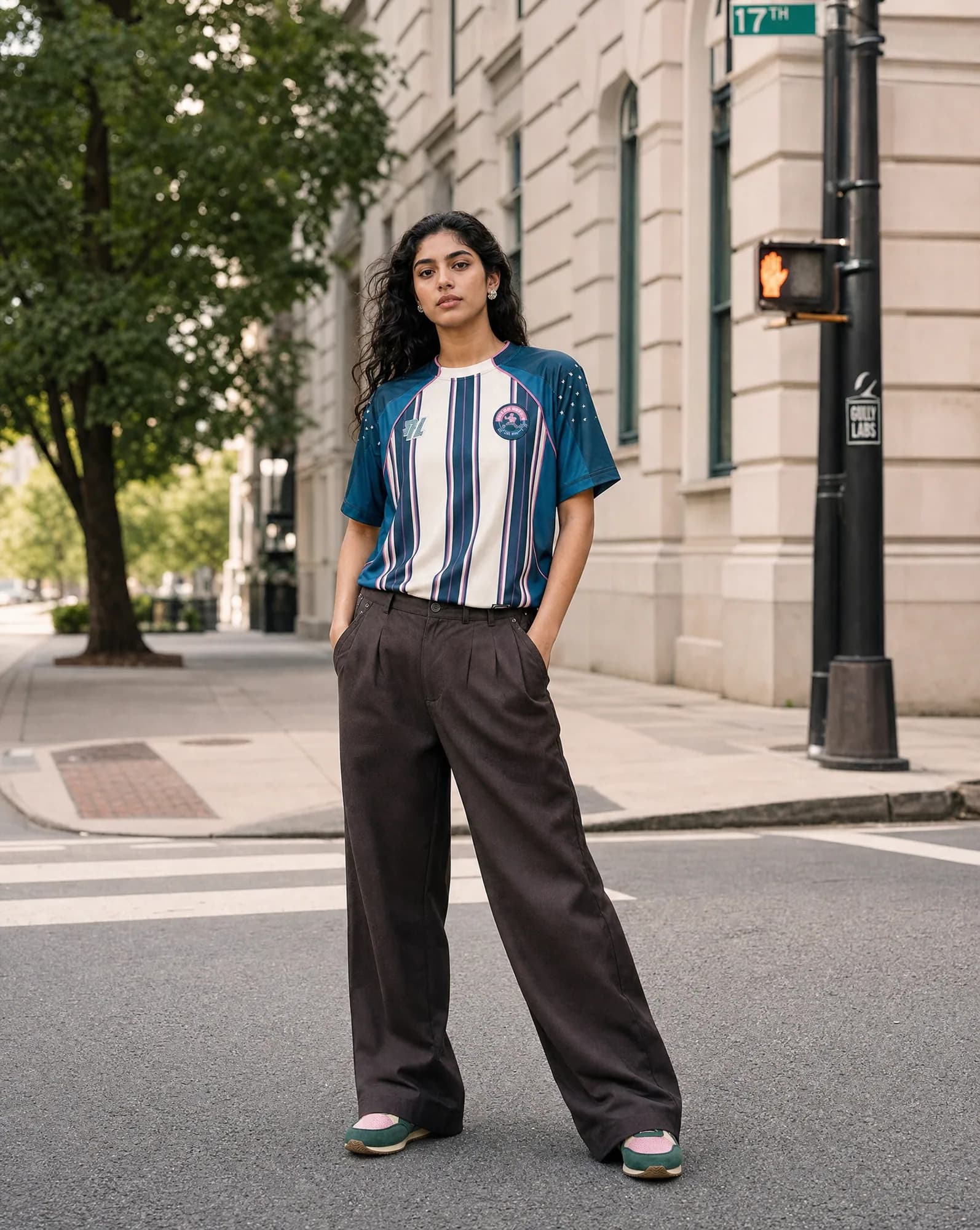 AI on-model look for Gully Labs: a woman in a striped jersey and Gully Labs sneakers on a city street