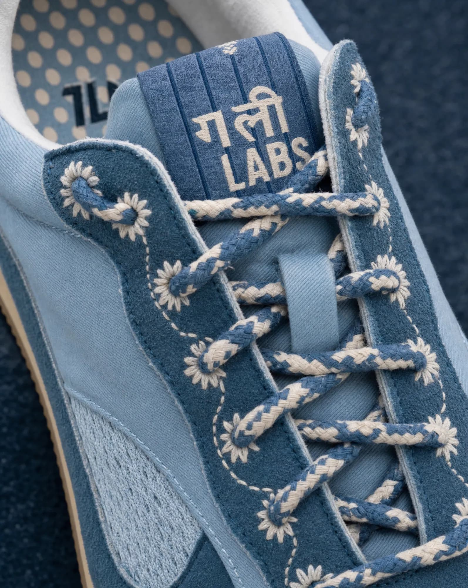 After: AI detail shot of the same sneaker's embroidered laces