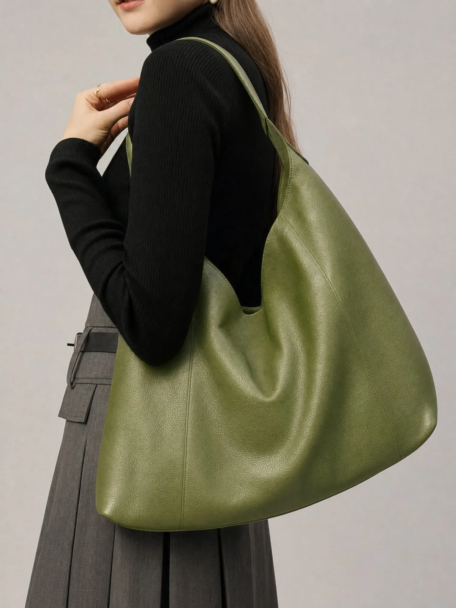 Latico green leather tote on model, made by Helium