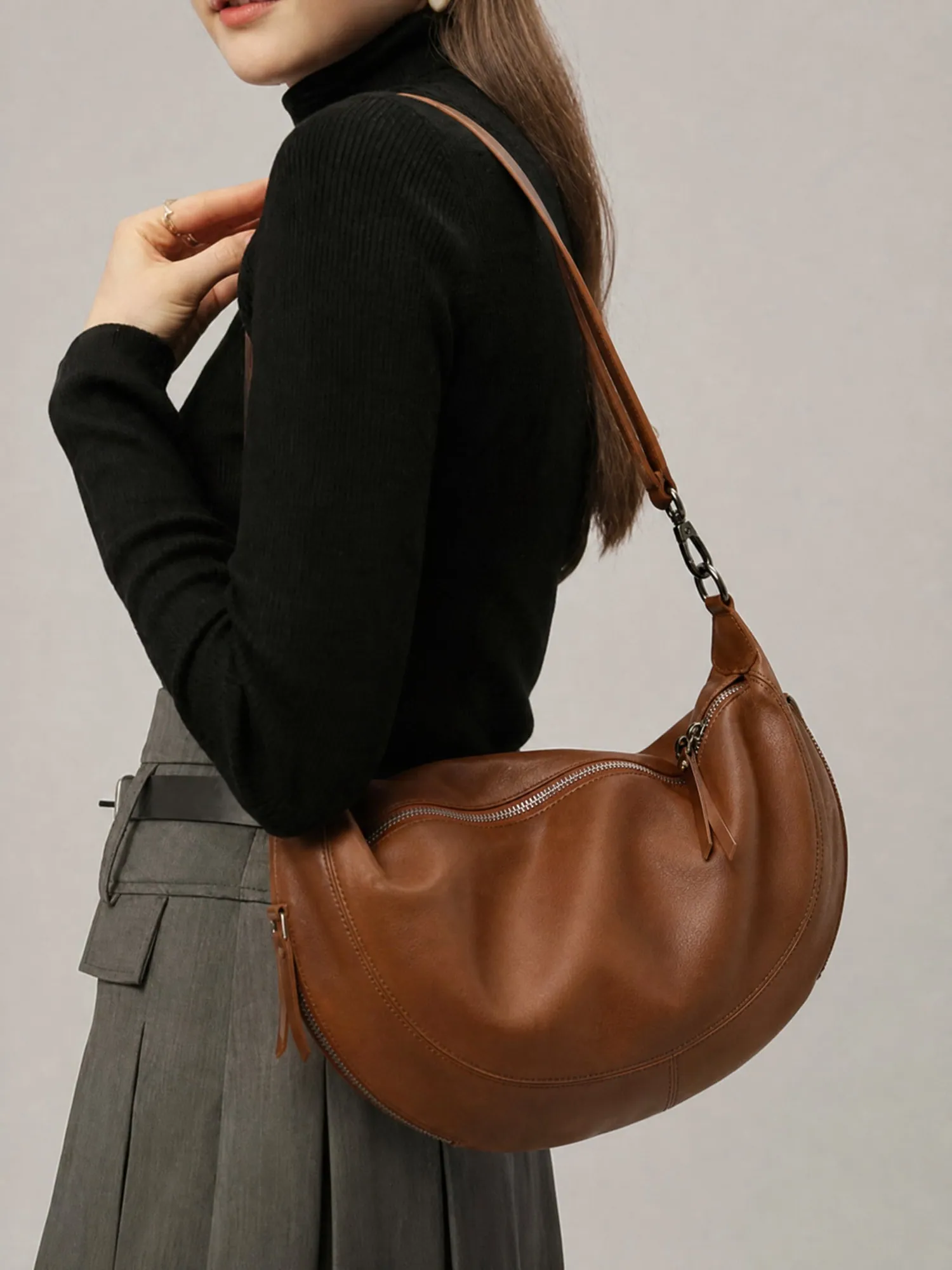 AI on-model shot: Latico green leather hobo bag
