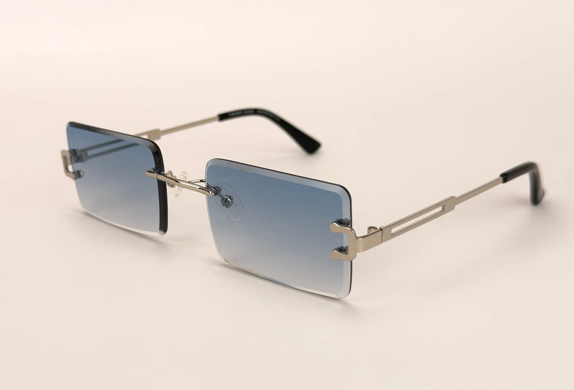 Lenskart rimless sunglasses packshot made by Helium